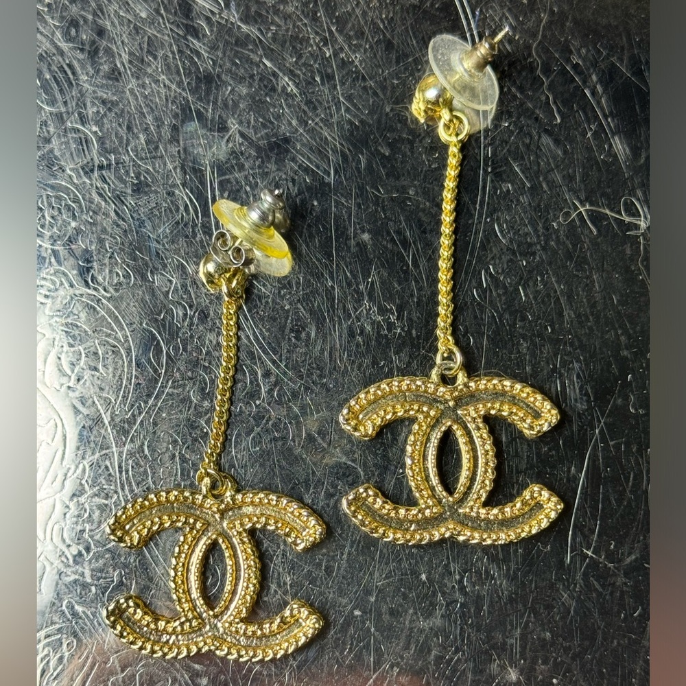 Authentic Chanel CC gold tone pierced drop dangle earrings limited edition.